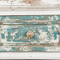 Postarzana komoda drewniana z turkusowymi szufladami