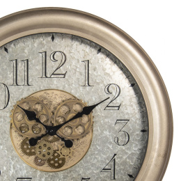 Metalowy zegar ścienny z ozdobnymi trybami vintage B