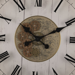 Okrągły zegar ścienny vintage z ozdobnym mechanizmem