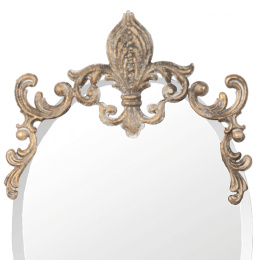 Owalne lustro ścienne z barokowym ornamentem