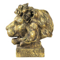 Posąg na podstawie złota głowa lwa z różami