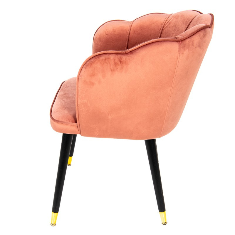 Tapicerowane różowe krzesło muszelka na czarnych nóżkach