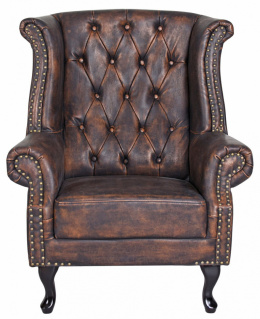 Brązowy pikowany fotel uszak w stylu klasycznym