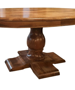Owalny stół drewniany na grubej rzeźbionej nodze
